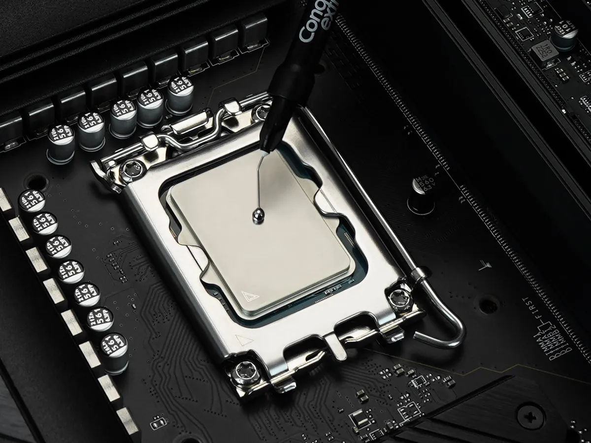 Conductonaut liquid metal being applied to a CPU die